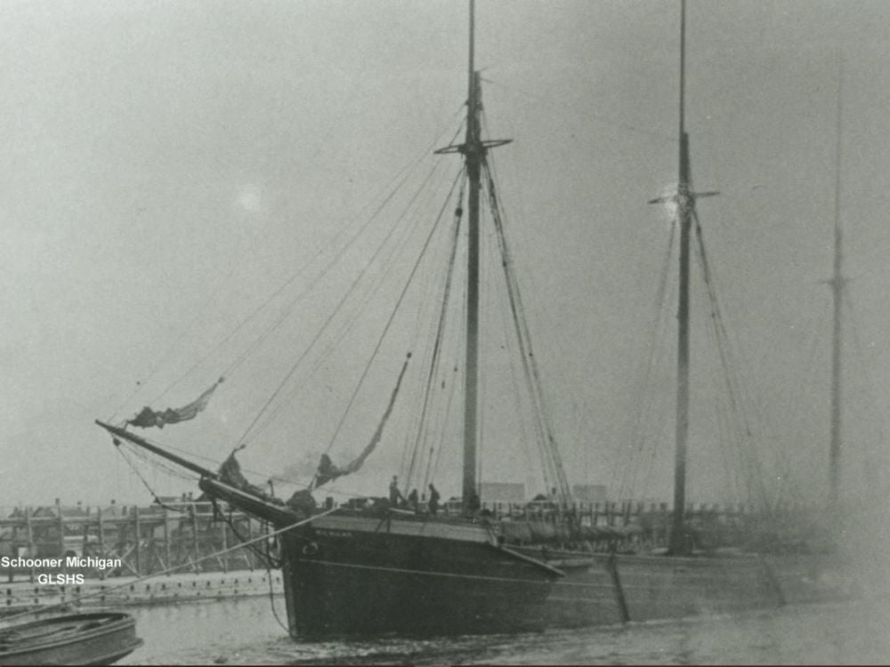 A black and white image of a large schooner