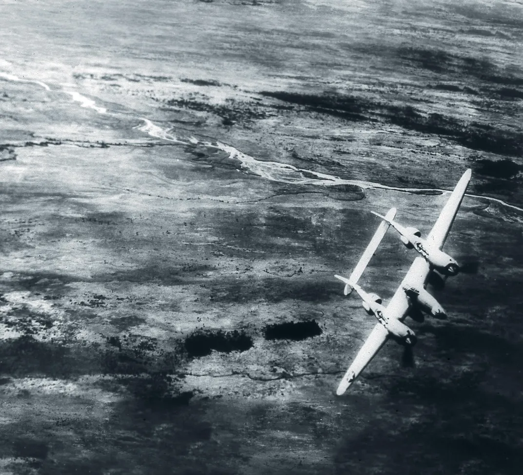 P-38 plane from the 475th Fighter Group soaring