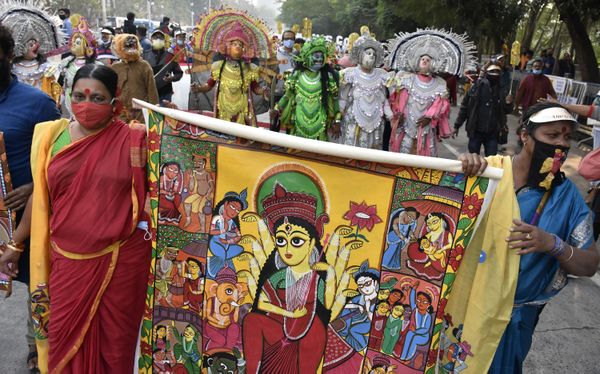 Cultural procession in the city street of Kolkata. thumbnail