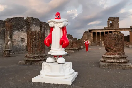 A sculpture of a giant lobster disguised as a column, made by pop artist Philip Colbert, stands in Pompeii