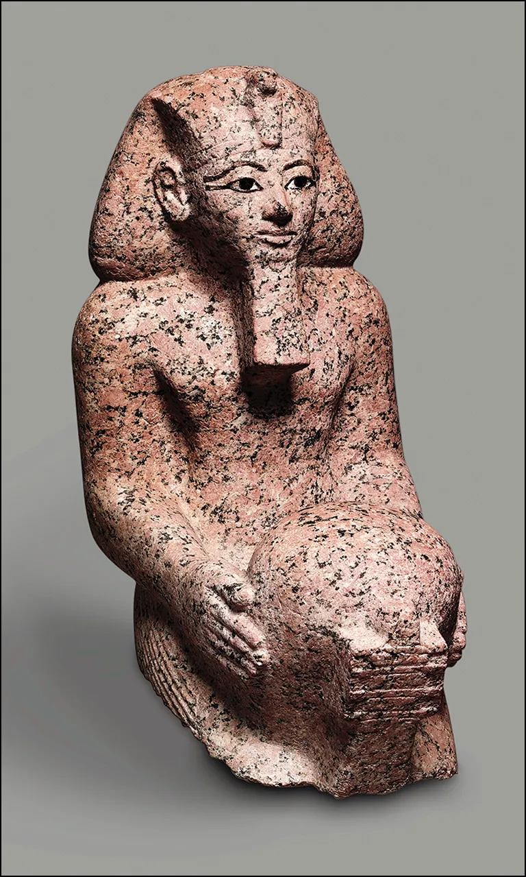 a_small_kneeling_statue_of_hatshepsut_mma_2331_with_its_face_fully_intact-_616mm_h__325m.jpeg