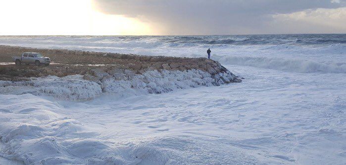 Sea foam at Naqoura Beach, Lebanon