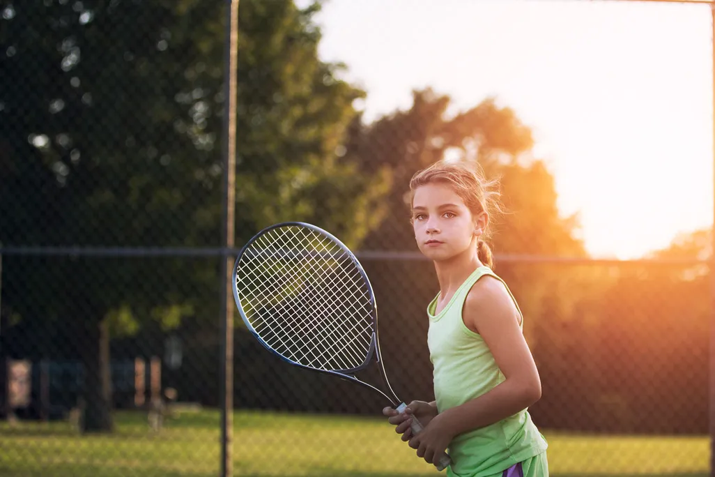 Child Playing Tennis