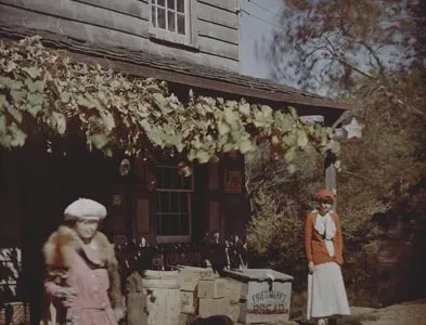 Karl Struss (1886-1981). "Two women in front of a vine covered country store," c. 1910.