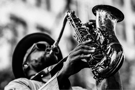 Few things personify cool like a shades-wearing instrumentalist masterfully commanding the saxophone.