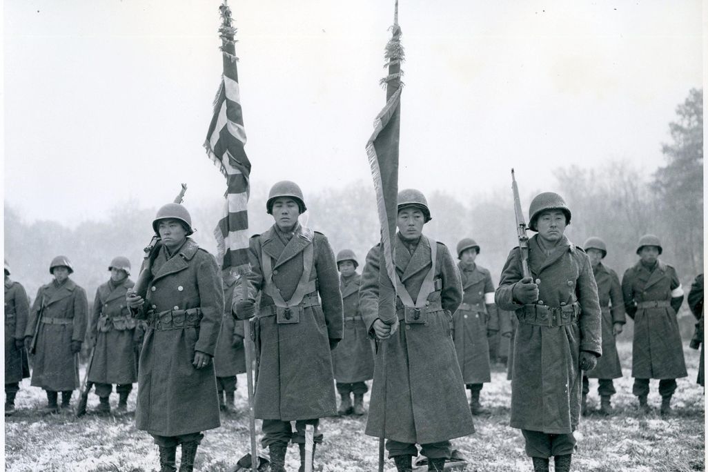 Stunned survivors of the Lost Battalion rescue stand ready for review by General Dahlquist