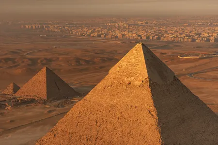 The ancient pyramids of the Giza Plateau stand over the western edge of&nbsp;&nbsp;the city of Cairo.