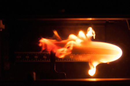 A flame in space, as photographed during a BASS (Burning and Suppression of Solids) experiment.