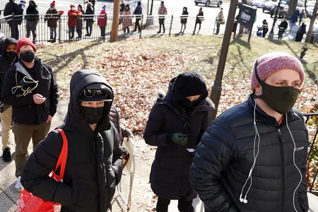 Residents of Washington, D.C. wait in line to get Covid-19 test kits in December of 2021. The United States lagged behind other nations in testing during the first few months of the pandemic.