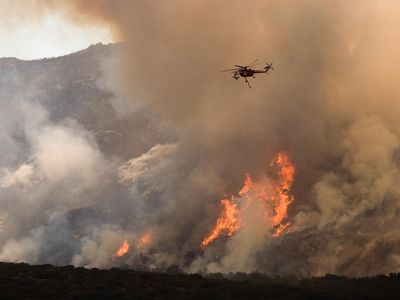 A helicopter being used to fight wildfire