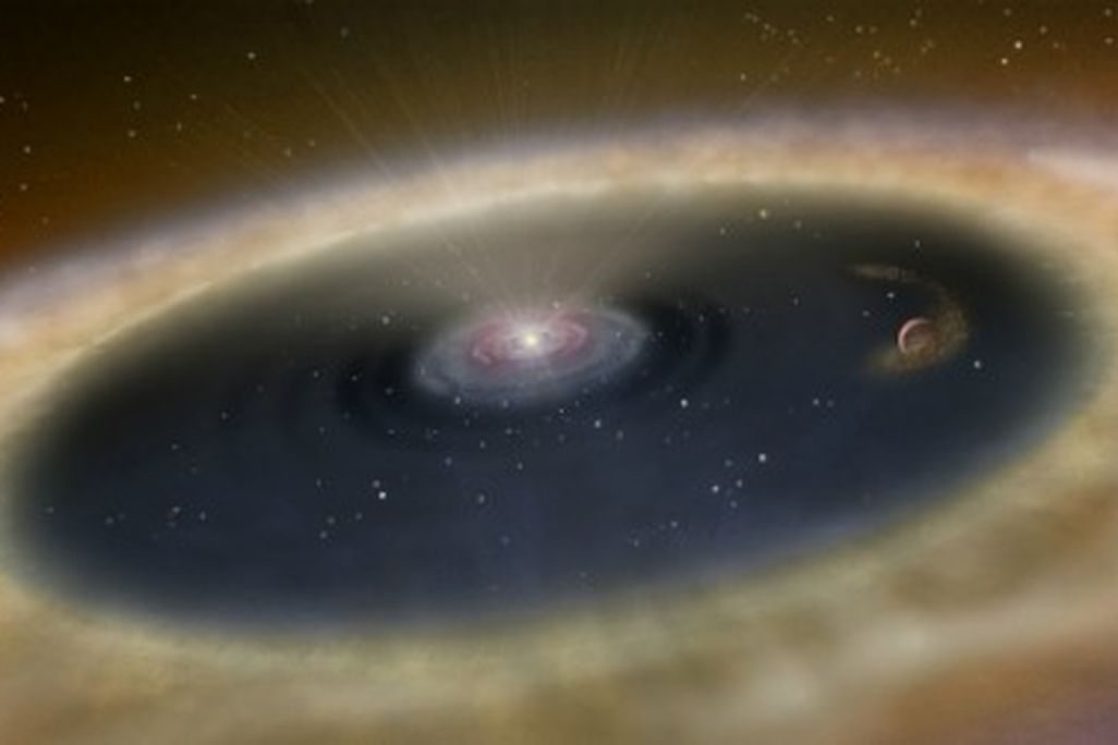 An artist's conception of the star LkCa 15 and the nearby protoplanet