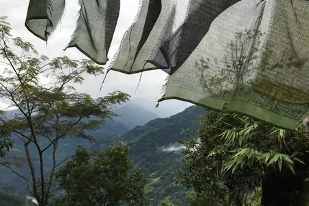 Prayer flags in North Sikkim, where the author traveled in search of clues about his grandfather