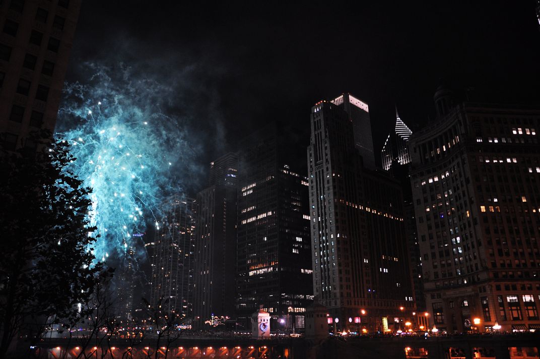 Fireworks signal the end of the holiday parade in Chicago ...