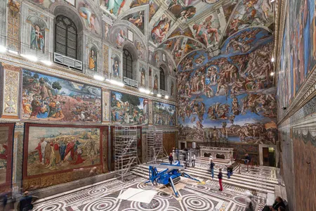 The tapestries depict scenes from the lives of St. Paul and St. Peter.