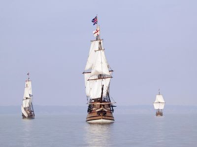 Replicas of English sailing ships on the James River — similar ships would have brought English colonists to Jamestown in 1607