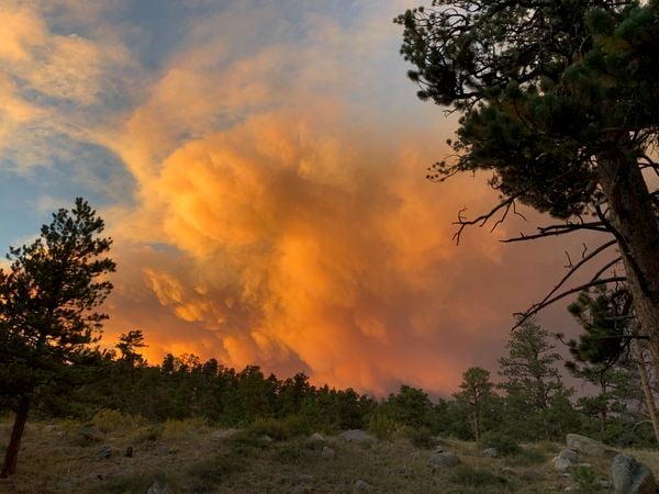 Setting Sun sets ablaze the smoke clouds from faraway Cameron Peak fire thumbnail