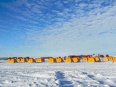 Members of the Lake Whillans drill team lived in yellow tents studding the Antarctic landscape.