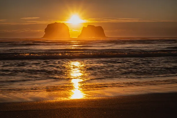Sunset and sunburst at Twin Rocks, Oregon thumbnail