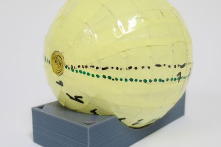 This layered metal sphere is a wormhole for magnets.