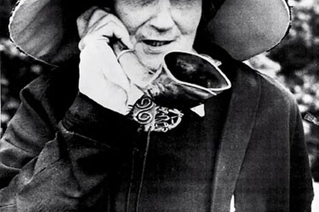 Madame de Meuron, a Swiss eccentric, with her characteristic ear trumpet and hat