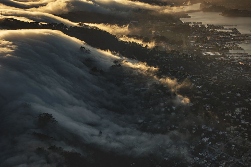 Late afternoon fog over Sausalito, California. This image was taken while flying my plane.