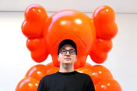 On May 20, the artist KAWS, also known as Brian Donnelly (above at Rockefeller Center in August 2021), received from the Smithsonian&#39;s Hirshhorn Museum and Sculpture Garden an award for &quot;his contributions to art and popular culture.&quot;