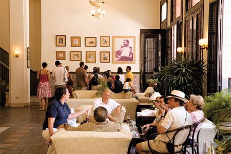 The almost proprietary interest that Cubans take in Hemingway can be seen in the lobby of the Ambos Mundos Hotel (above), where photographs of the author overlook the lobby.