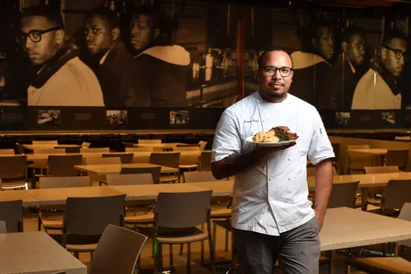 Local Washington, D.C. based chef Jerome Grant was one of 12 presenters in the DCPS Career Ready Internship program for students interested in hospitality careers. Grant shared his philosophy around creating unforgettable dining experiences as a former chef in Smithsonian spaces including the Mitsitam Café at the National Museum of the American Indian and Sweet Home Café at the National Museum of African American History and Culture. (Marvin Joseph, The Washington Post via Getty Images)