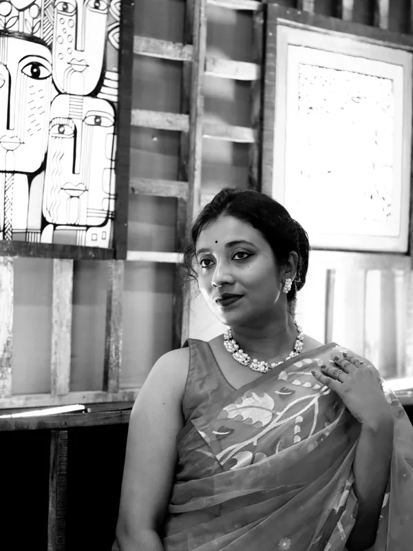 A black and white photograph clicked while pandal hopping in Kolkata on a festive eve of Durgapuja thumbnail