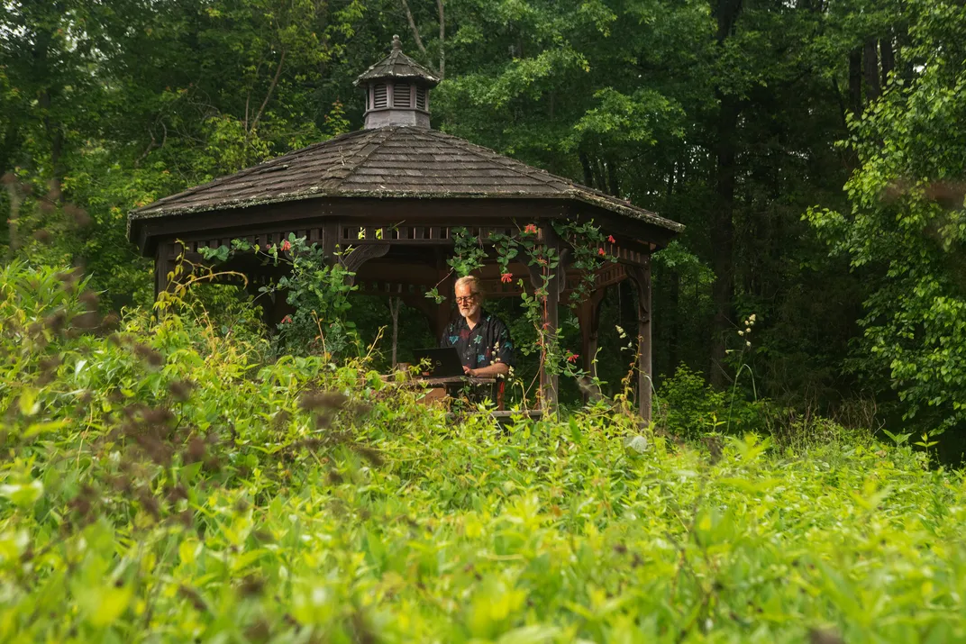 Droege begins his morning work routine. His first job with the U.S. Geological Survey involved coordinating a citizen science survey of birds.