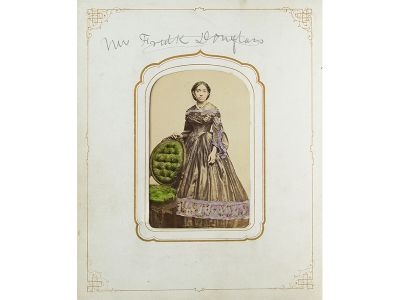 This hand-colored carte de visite depicts Virginia L. Molyneaux Hewlett Douglass, who married Frederick Douglass, Jr., the son of the famous African American leader. The mount is inscribed: “Mrs. Fredk Douglass.”