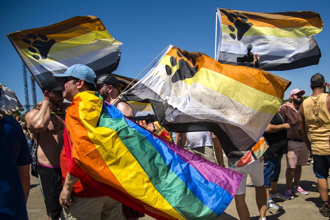 Some gay men possessing “traditionally masculine” physical characteristics refer to themselves as “bears” and have their own flag, which includes a bear paw print.