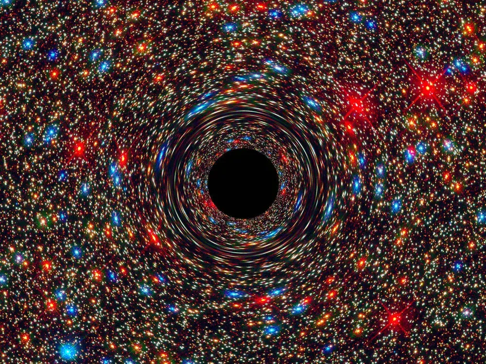 A visualization of a black hole surrounded by colored light and warping spacetime