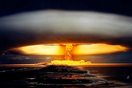 Nuclear material explodes into the sky during a thermonuclear test by the French Army in 1970.