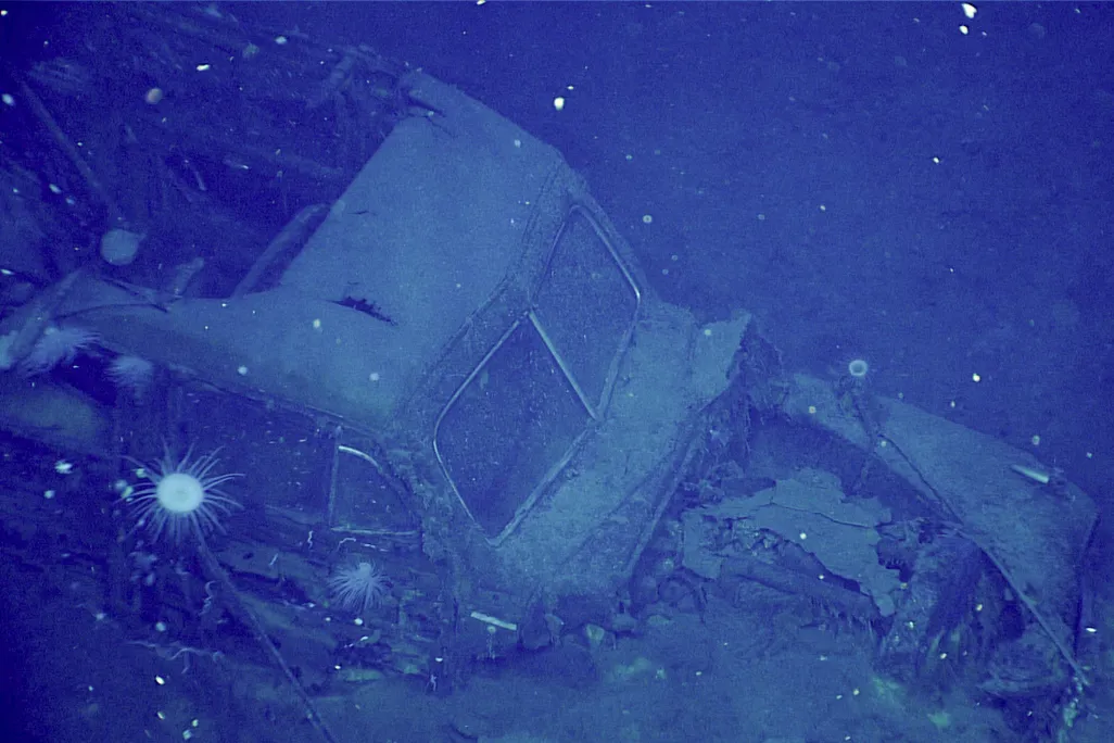 Underwater view of old car