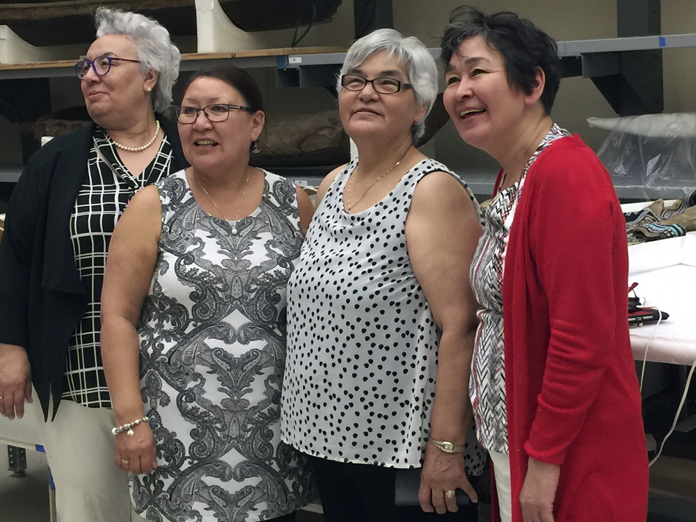Manitok Thompson, Veronica Connelly, Rosie Kowna Oolooyuk, and Bernadette Dean at the National Museum of the American Indian's Cultural Resources Center. The four women—skilled caribou and sealskin clothing makers, and fluent Inuktitut-speakers and knowledge keepers—traveled to Washington from Nunavut as guests of the Embassy of Canada to attend the opening of the embassy's exhibition 