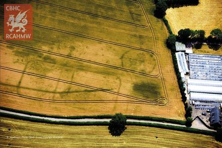 The hot, dry summer of 2018 revealed the long-lost outlines of Roman forts and roads in Wales. This photo shows a Roman fort discovered near Carrow Hill.