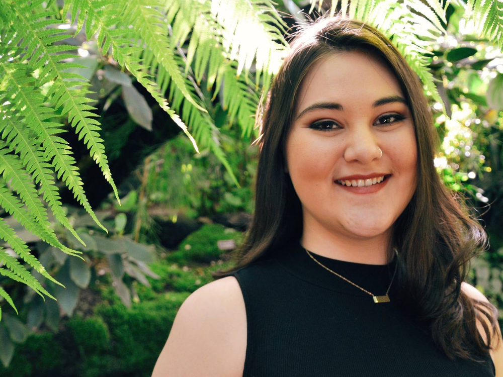 Gabrielle Lee (Kanaka Maoli), the first Native Hawaiian cultural interpreter on the staff of the National Museum of the American Indian, in a small section of the New York Botanical Garden that features plants native to Hawai‘i. (Courtesy of Gabbi Lee)