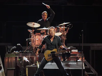 Bruce Springsteen performs with drummer Max Weinberg in 2008. 
