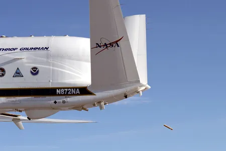 NASA’s Global Hawk aircraft deploys a dropsonde during a test flight over the Dryden Aeronautical Test Range in August 2015. 