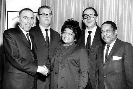 Vivian Carter (center) and her husband, Jimmy Bracken (far right), launched Vee Jay Records in 1953.
