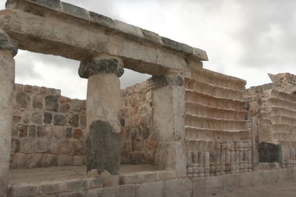 A Maya temple with stairs and columns
