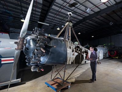 Curator Roger Connor admires the Cierva C.8W Autogiro, the United States’ oldest successful rotorcraft, which is currently in storage.