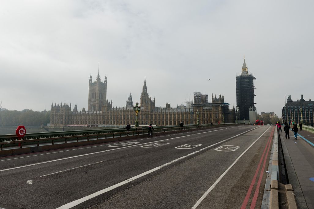 Pedestrians cross an almost deserted Westminster Bridge as England enters a four-week lockdown to tackle the spread of coronavirus, on 05 November, 2020 in London, England