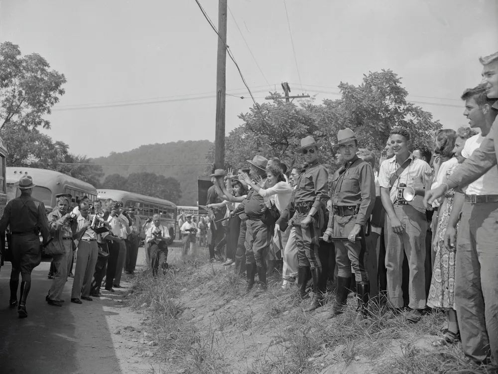 Protesters line up at Paul Robeson's concert near Peekskill, New York