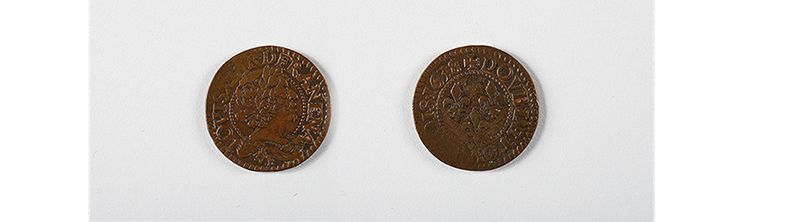 A team of Smithsonian scientists excavating the Hart Chalet site found a double tournois copper coin minted for French King louis XIII in 1634.  In pristine condition, it would have looked similar to this 1638 double tournois coin. (Images courtesy of the National Numismatic Collection, National Museum of American History, Smithsonian Institution. Image composite by Anna Torres)