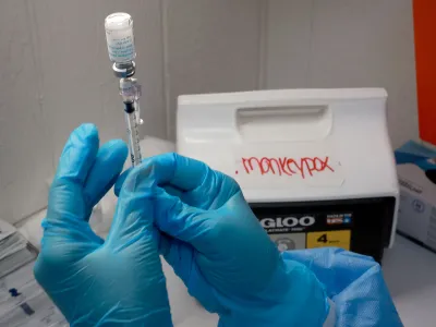 A registered nurse measures out a monkeypox vaccine in Miami, Florida.