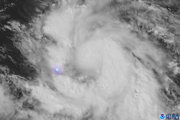 A gif image of lightning storms within Hurricane Elsa 