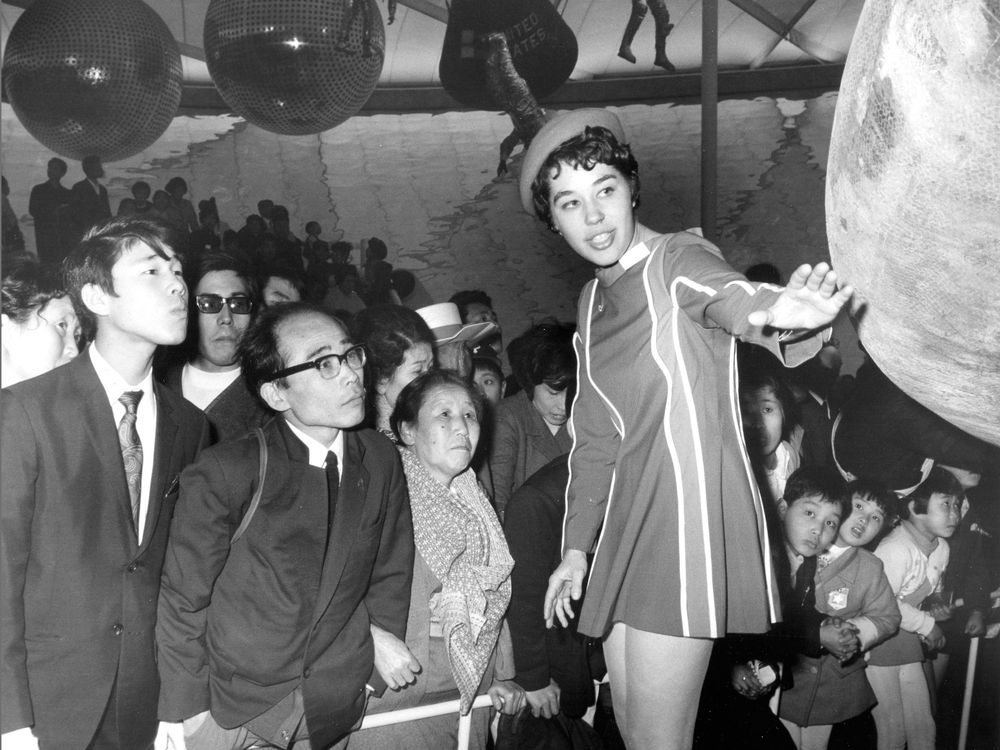 Beverly Gray at a 1970 expo in Japan explaining a spacecraft