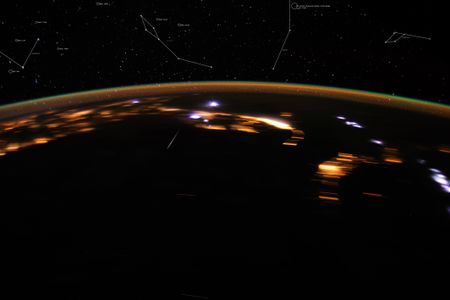 An image of the April 2012 Lyrid meteor shower raining down on Earth, taken from the International Space Station.